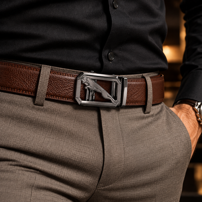 Men's brown textured genuine leather auto lock belt styled with a black shirt and grey formal trousers.